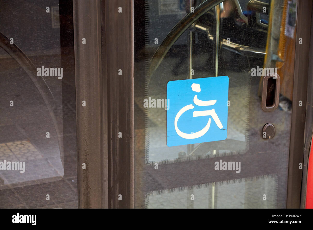 wheelchair sign on a public bus Stock Photo