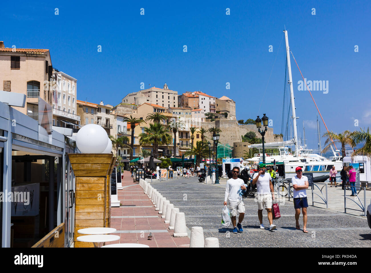 Calvi waterfront, citadel in background. Calvi, Corsica, France Stock Photo