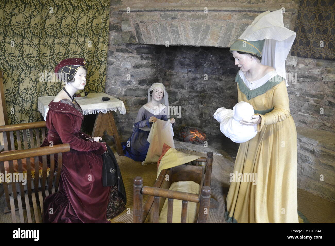 King Henry VII as a baby scene at Pembroke Castle, Pembrokeshire, Wales, UK Stock Photo