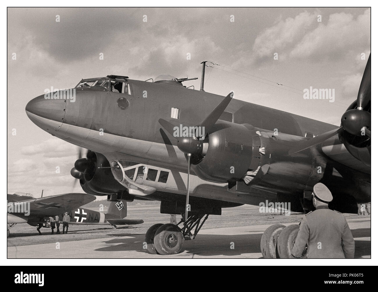 Focke-Wulf Fw 200 Condor Adolf Hitler's personal Luftwaffe Focke-Wulf Fw 200 Condor with Nazi Swastika insignia and fighter escort at Immola Airport during his visit to see Field Marshal Mannerheim 4 June 1942 in Finland Stock Photo