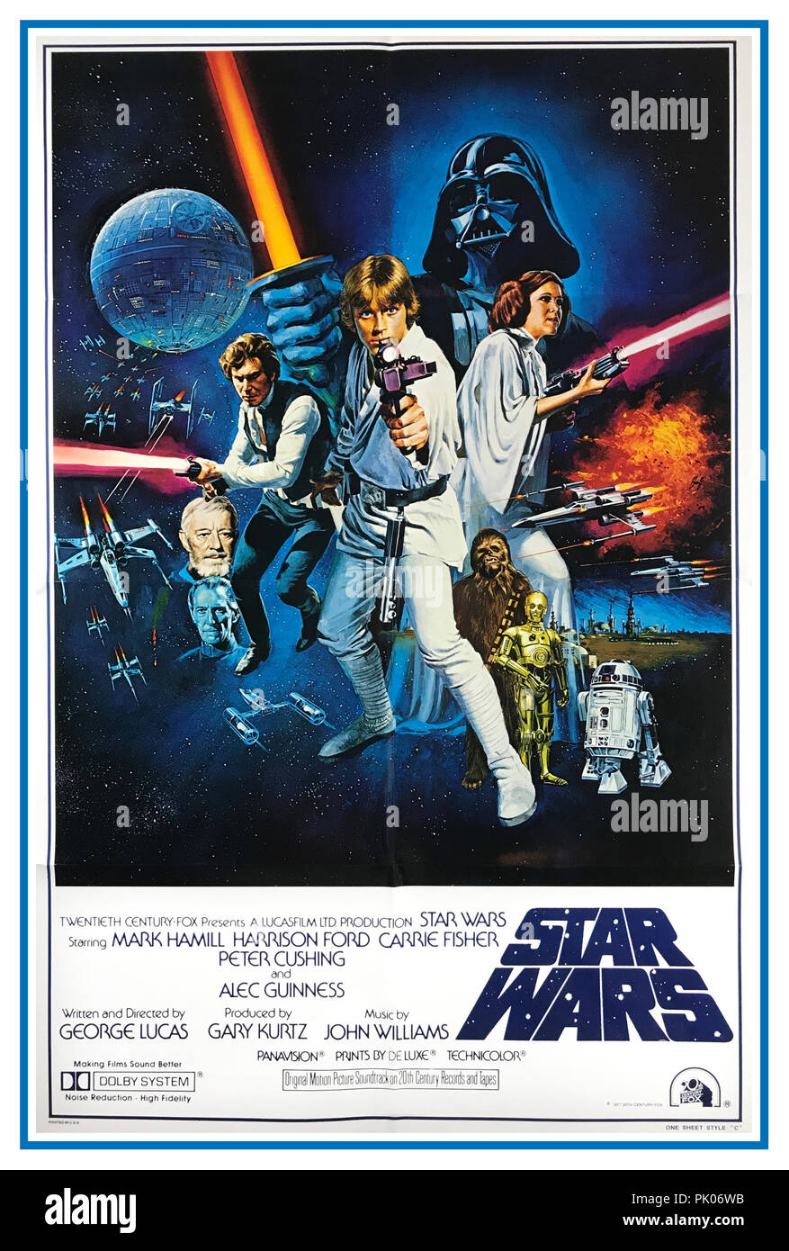 STAR WARS, 1977. Original international style movie film poster starring Mark Hamill, Harrison Ford, Carrie Fisher, Alec Guinness, Peter Cushing and directed by George Lucas. “A long time ago in a galaxy far, far away…” Stock Photo