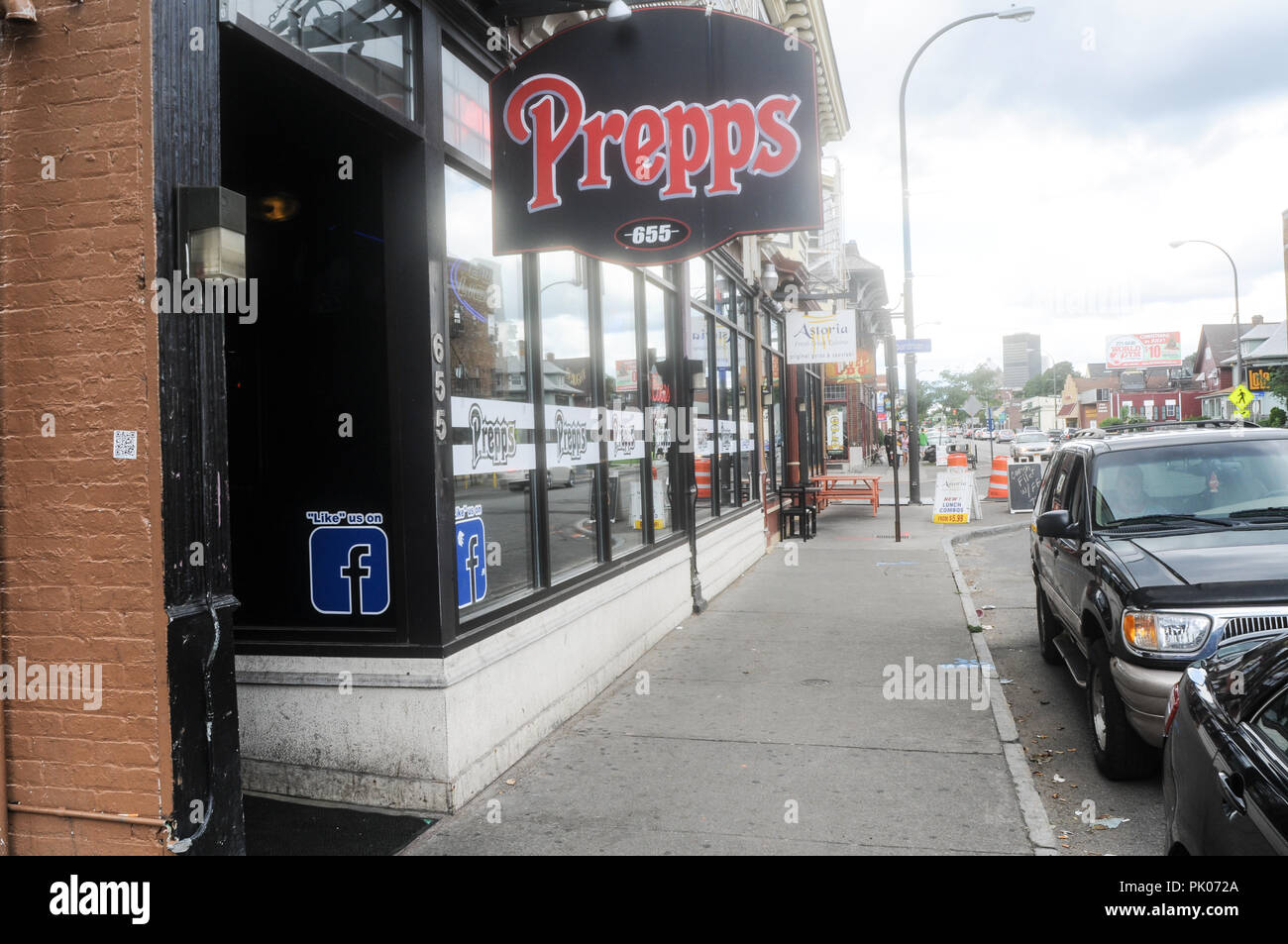 Streetscape and sidewalk of Monroe Avenue Rochester NY, USA Stock Photo