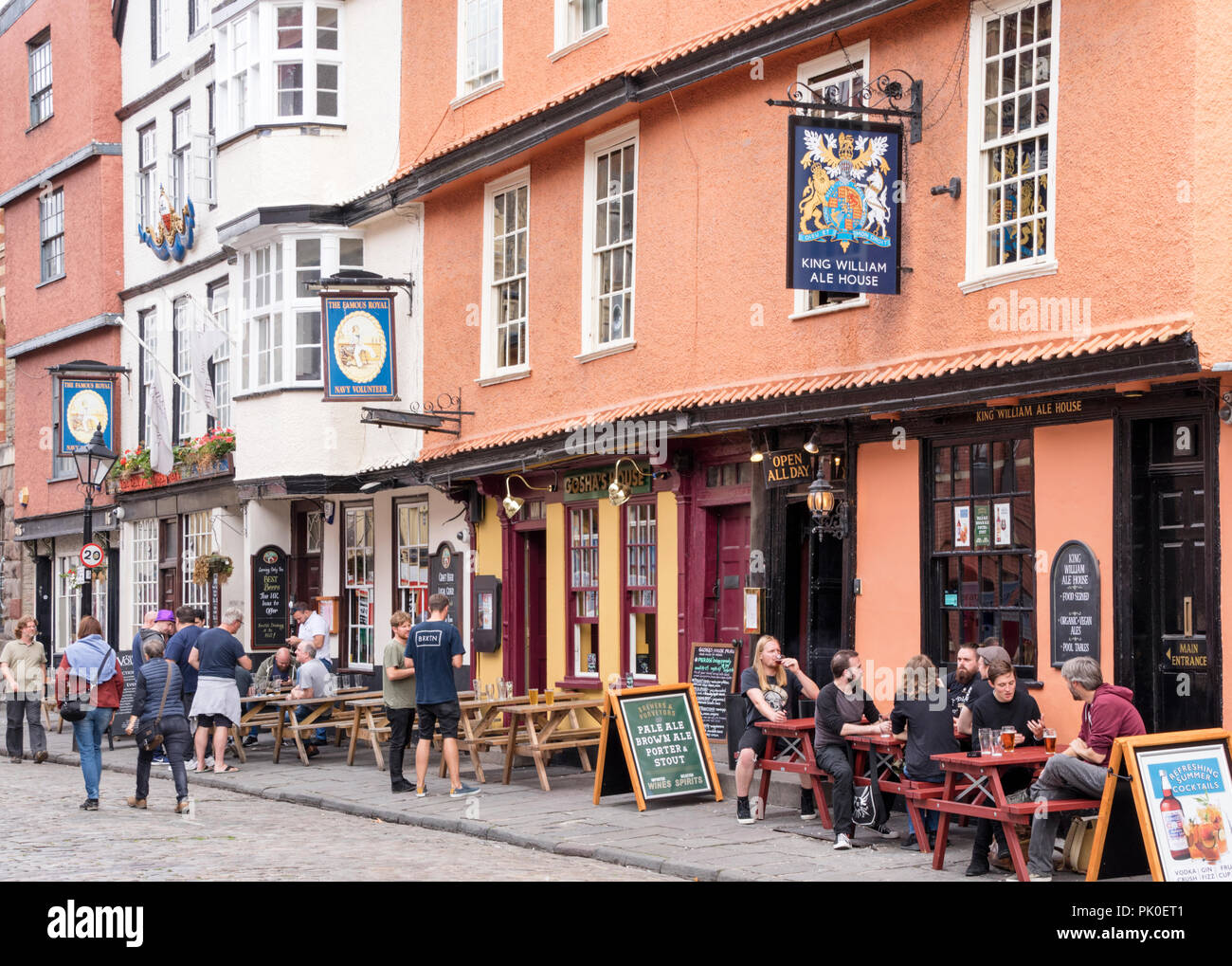 People relaxing in city of Bristol at the King William Ale House, Bristol England, UK Stock Photo