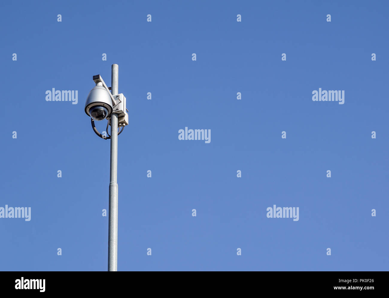 The CCTV dome camera on the evening of the sky background Stock Photo Alamy