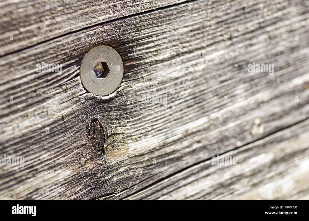 Close up from a rusty square head bolts Stock Photo