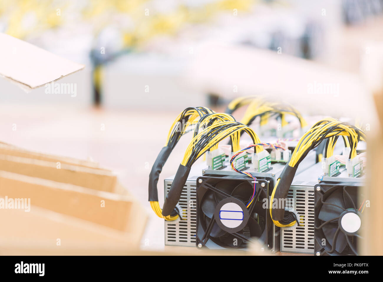 Rows of dedicated ASIC for cryptocurrency mining farm. Bitcoin, Ethereum  and other altcoins producing rig Stock Photo - Alamy