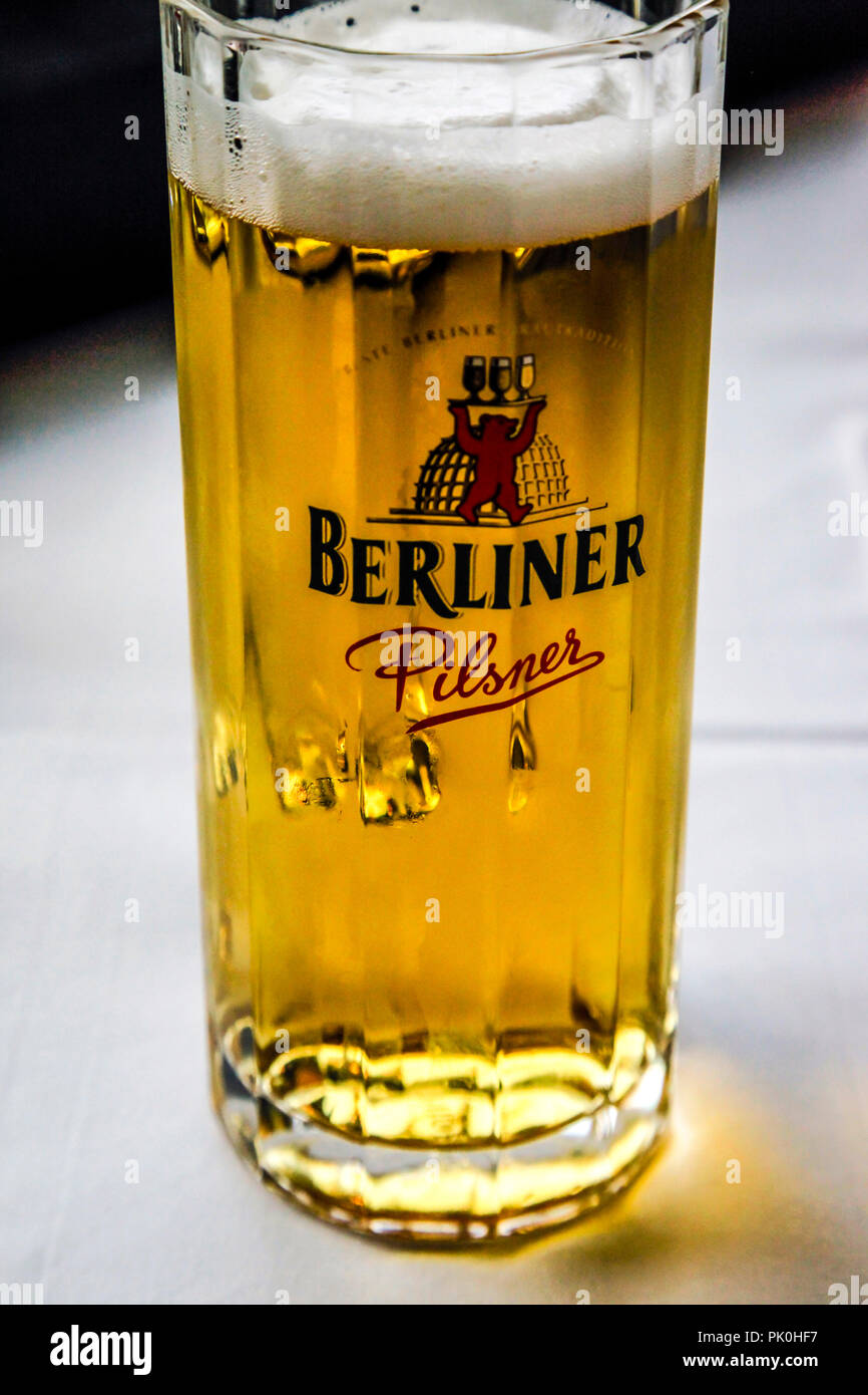 Glasses of Berliner Pilsner beer with foamy head sitting on a restaurant  table in Berlin, Germany Stock Photo - Alamy