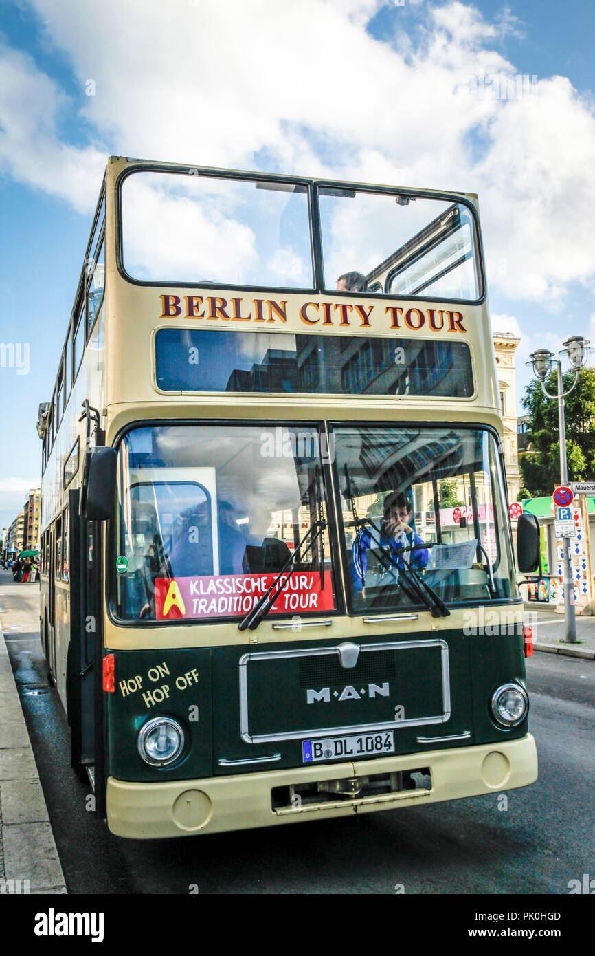 Hop on-Hop off, Double-decker open topped Berlin City Tour bus in Berlin, Germany Stock Photo