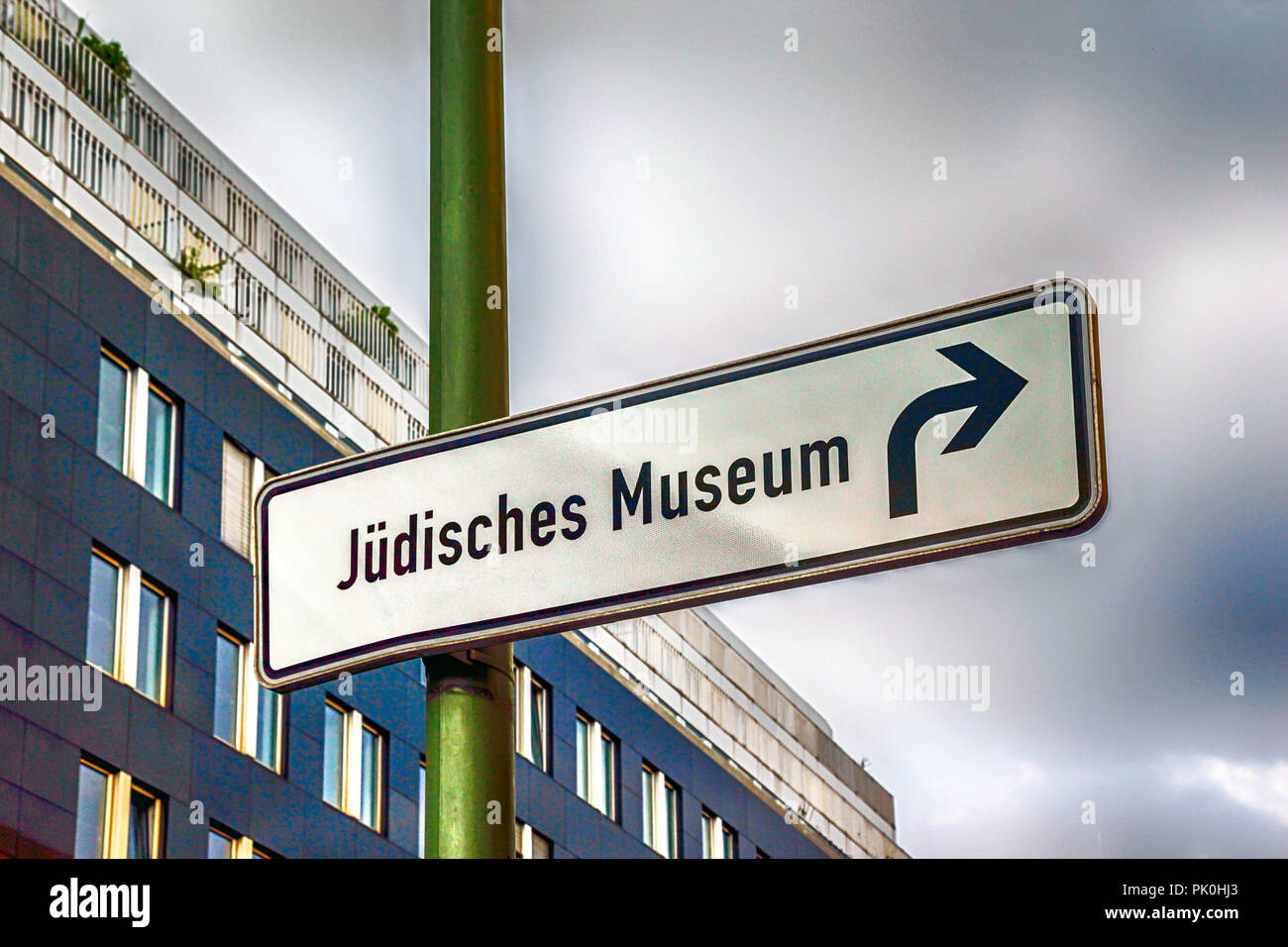 Direction street sign to the Jewish Museum in Berlin, Germany Stock Photo
