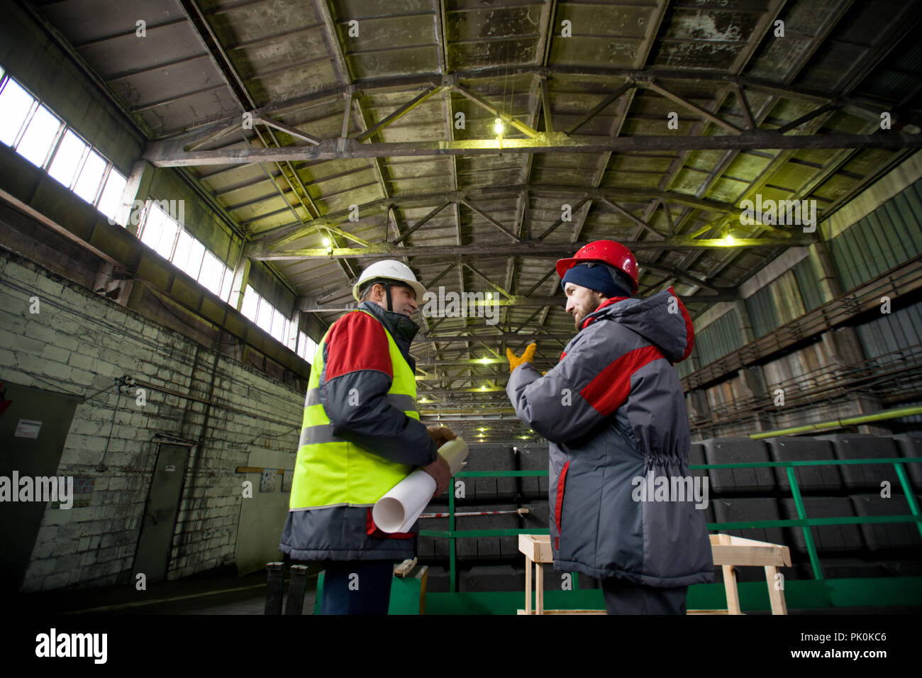 Workers at Industrial Plant Stock Photo