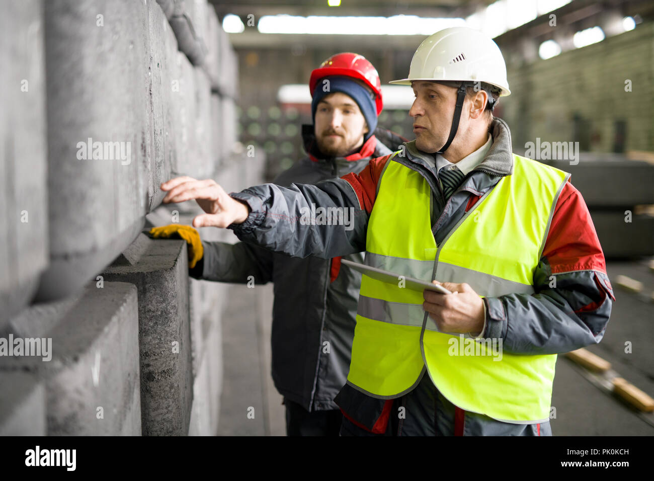 Two Workers at Industrial Plant Stock Photo