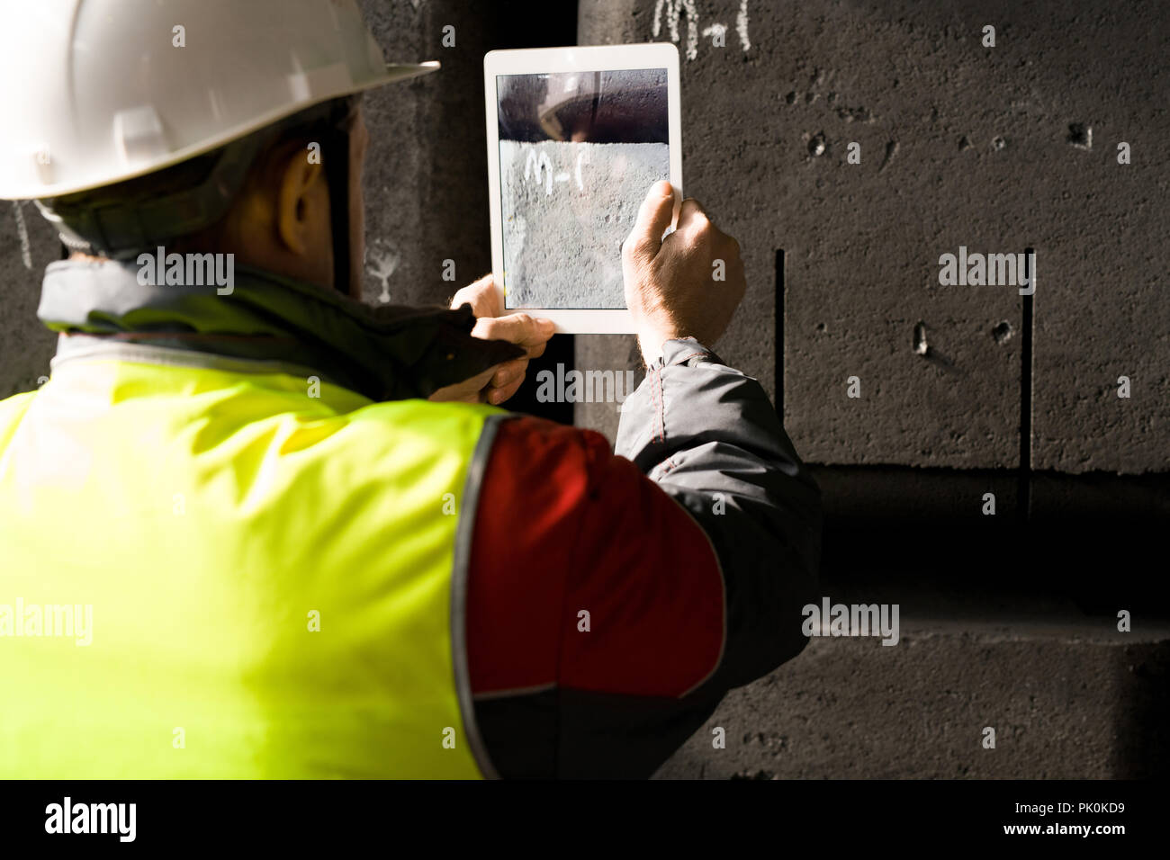 Worker Taking Photo Stock Photo