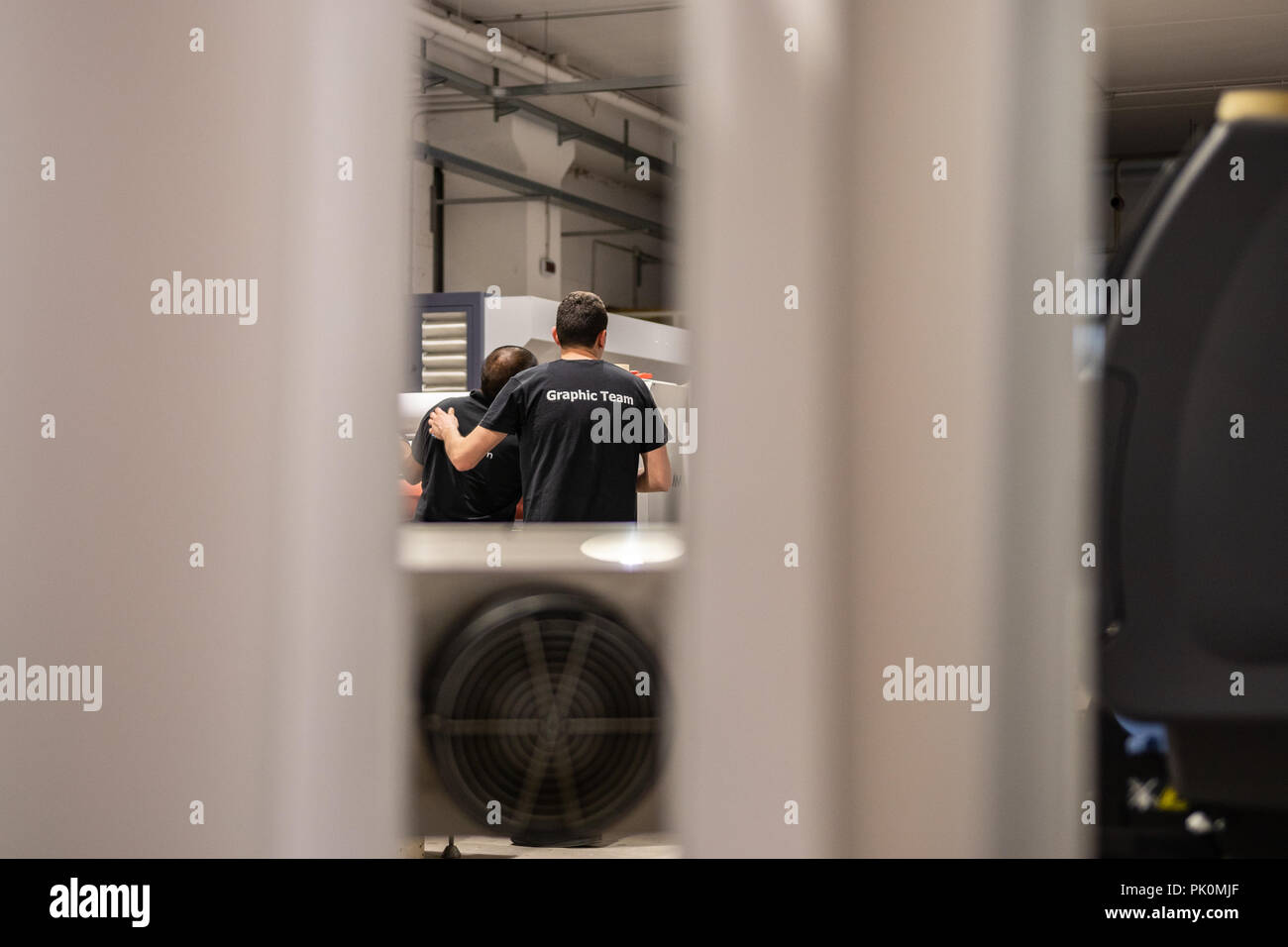 Production manager supervising every step of the project workflow, from