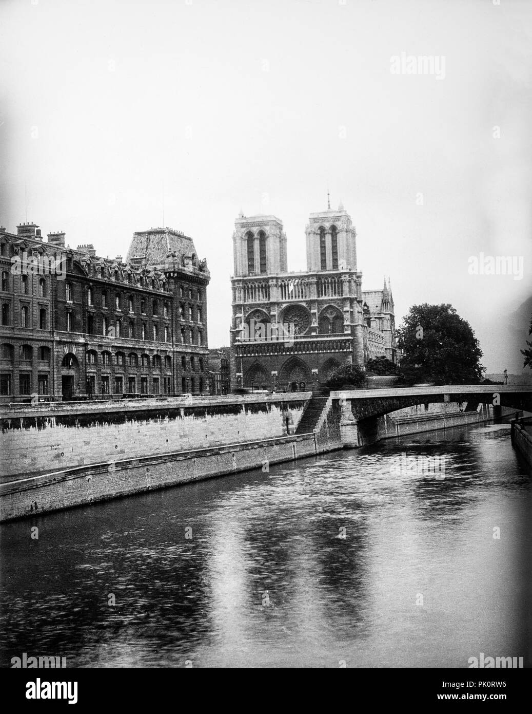 View of Notre Dame Cathedral and the River Seine in Paris, France  1931. Stock Photo
