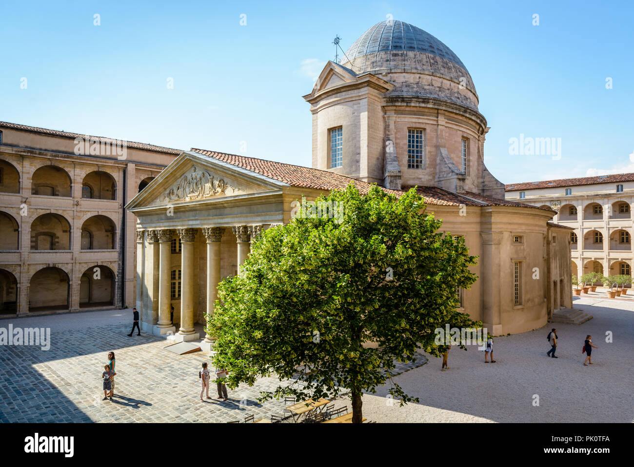 The baroque chapel crowned by an ellipsoidal dome and fronted by a portico in the courtyard of the former almshouse La Vieille Charite in Marseille. Stock Photo