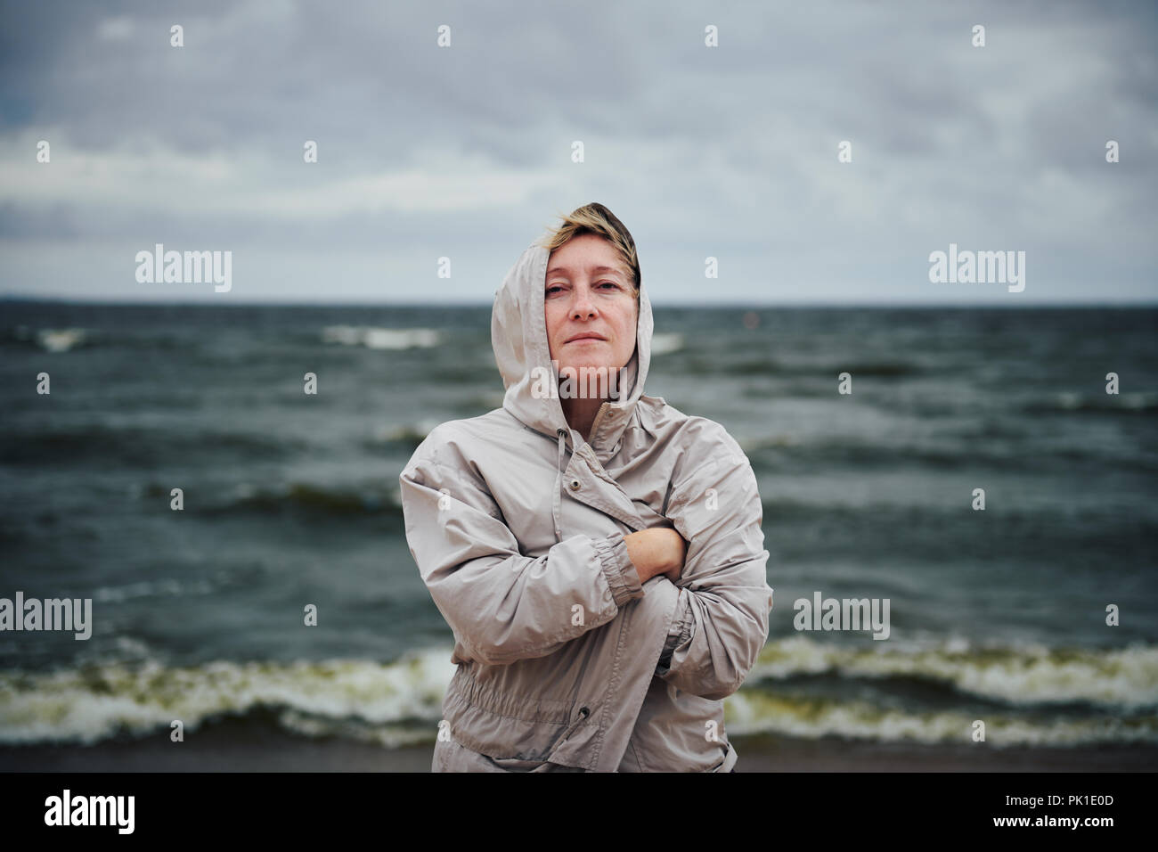 Woman windy jacket hi-res stock photography and images - Alamy