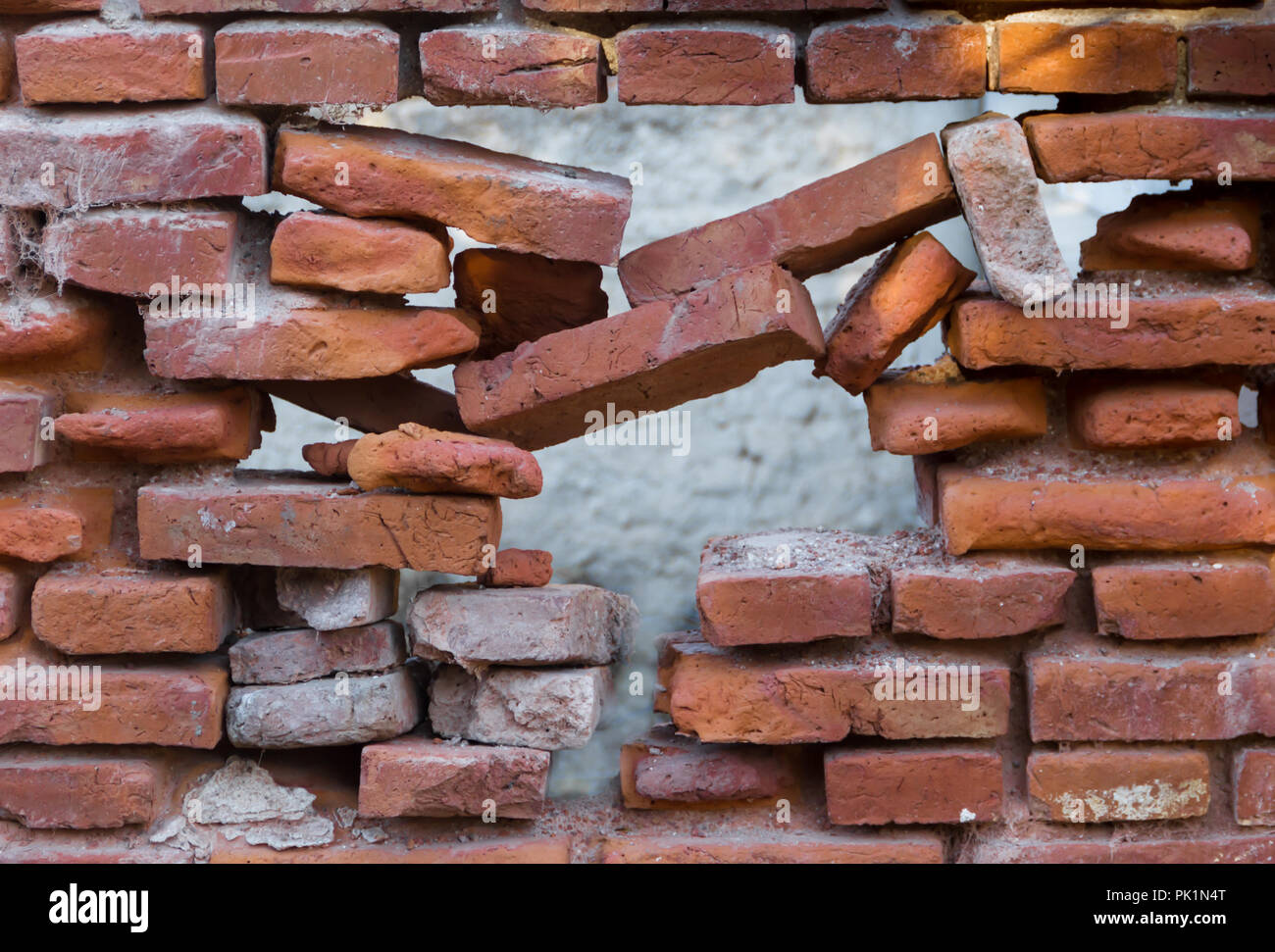 hole in the old bricks wall crumbling Stock Photo Alamy