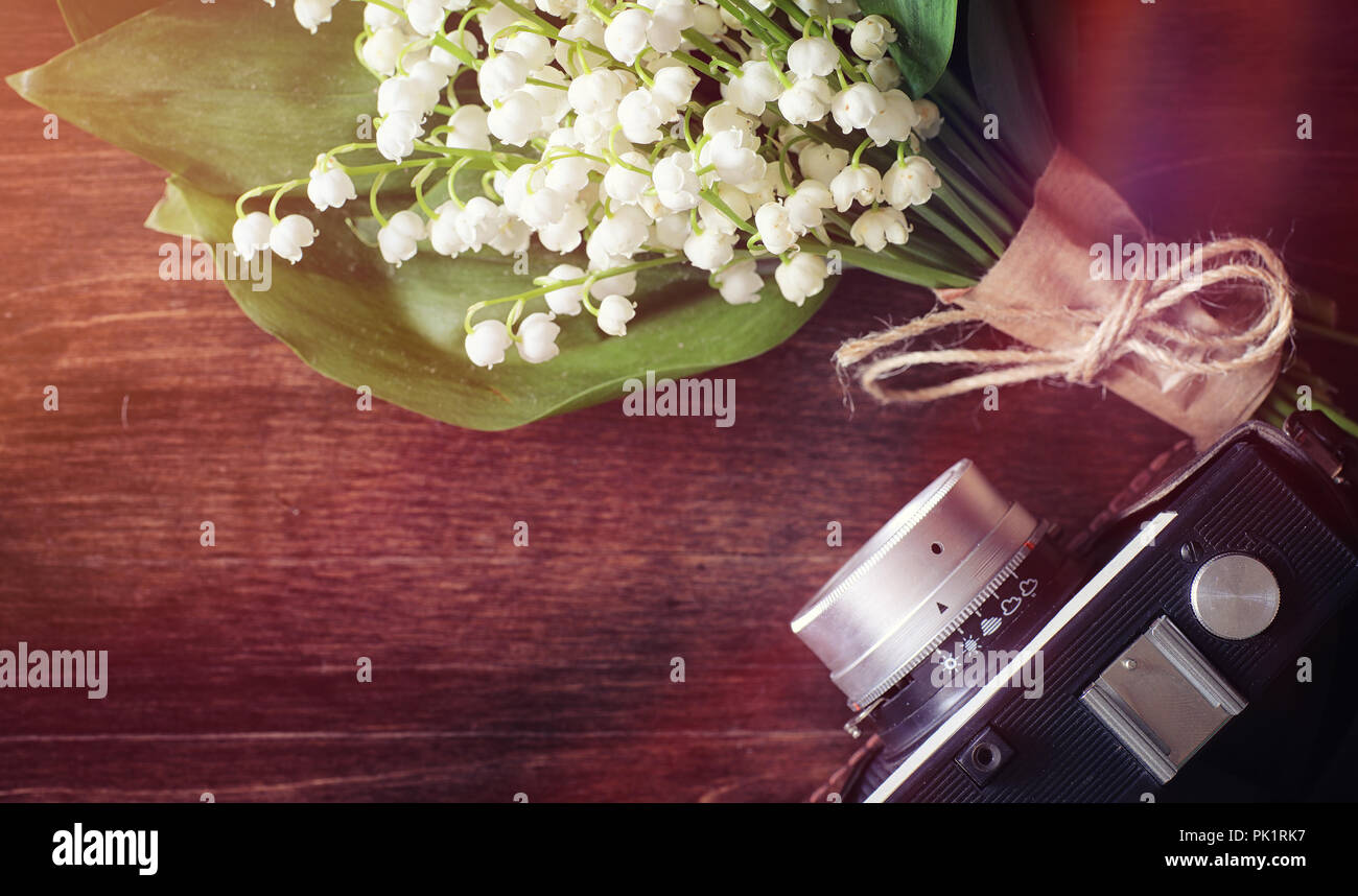 Bouquet of lilies of the valley on a table Stock Photo - Alamy