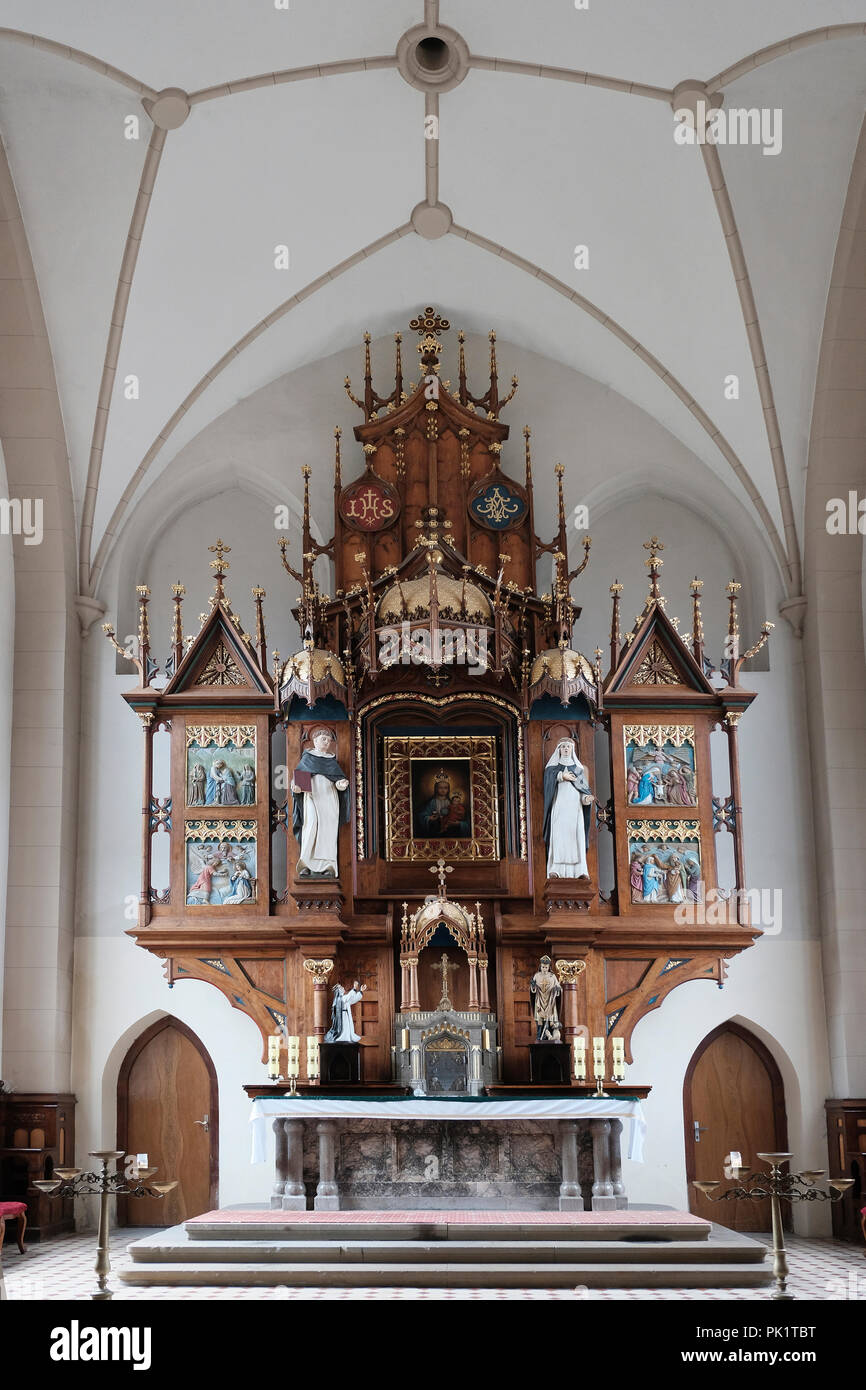 The wooden altar inside the Roman Catholic Church of St. Stanislaus in
