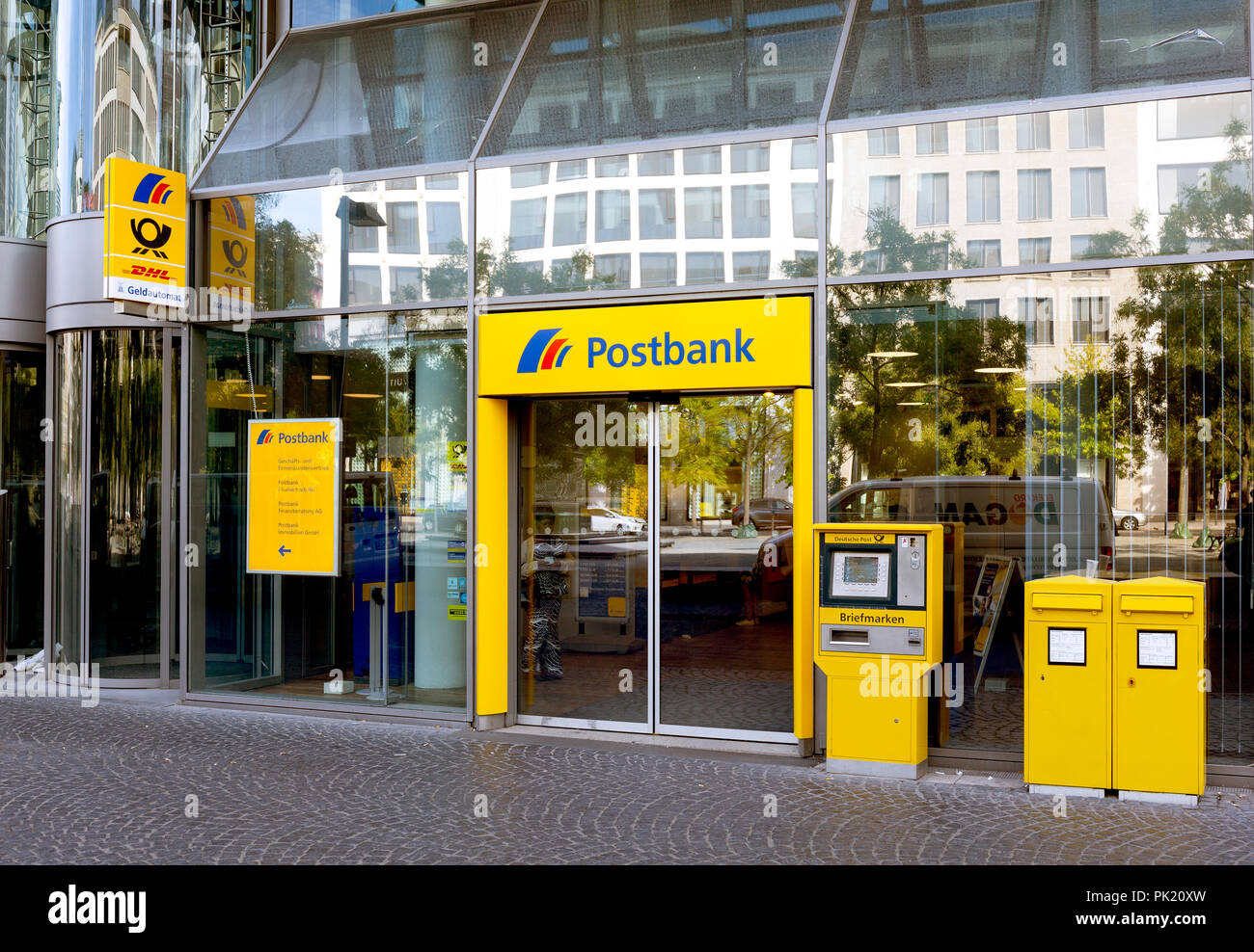 Frankfurt/Main, Germany - September 09, 2018: Postbank Office entrance with cash machine and letter box. Stock Photo