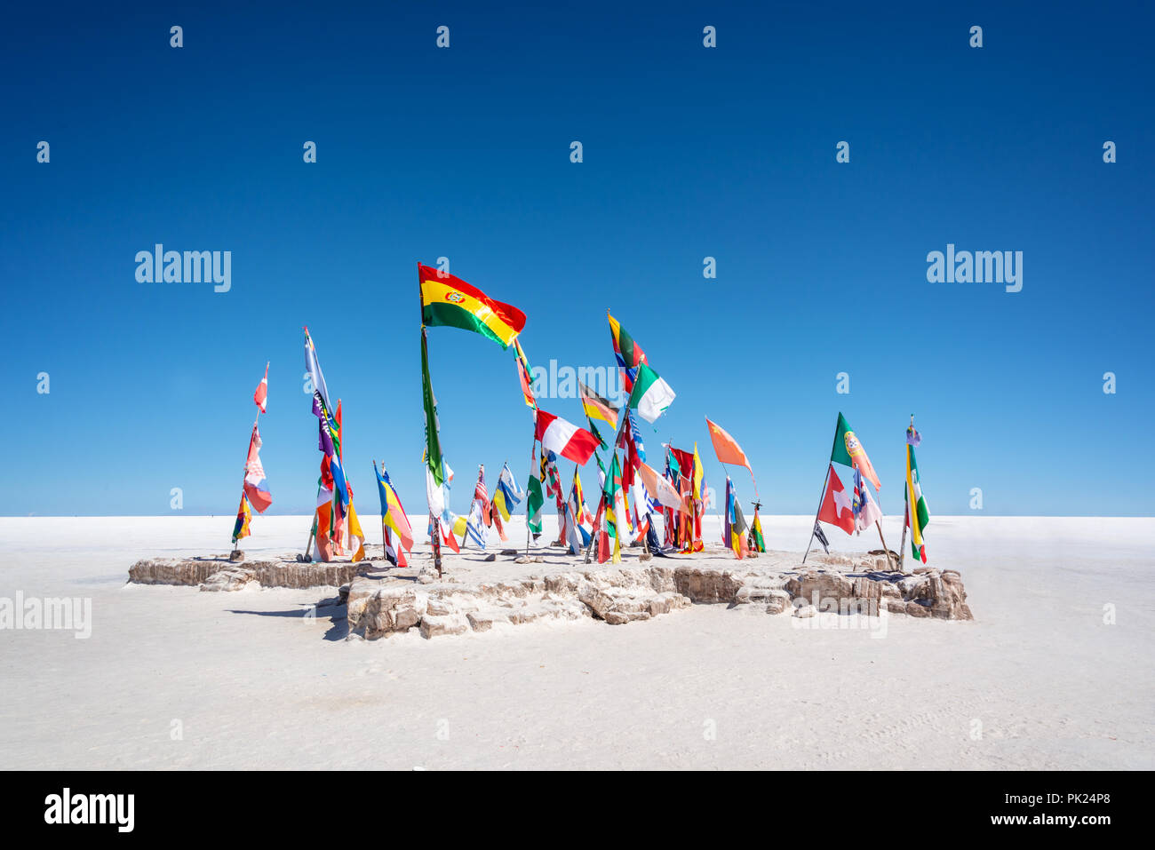 Colorful Flags From All Over the World at Uyuni Salt Flats, Bolivia, South America Stock Photo