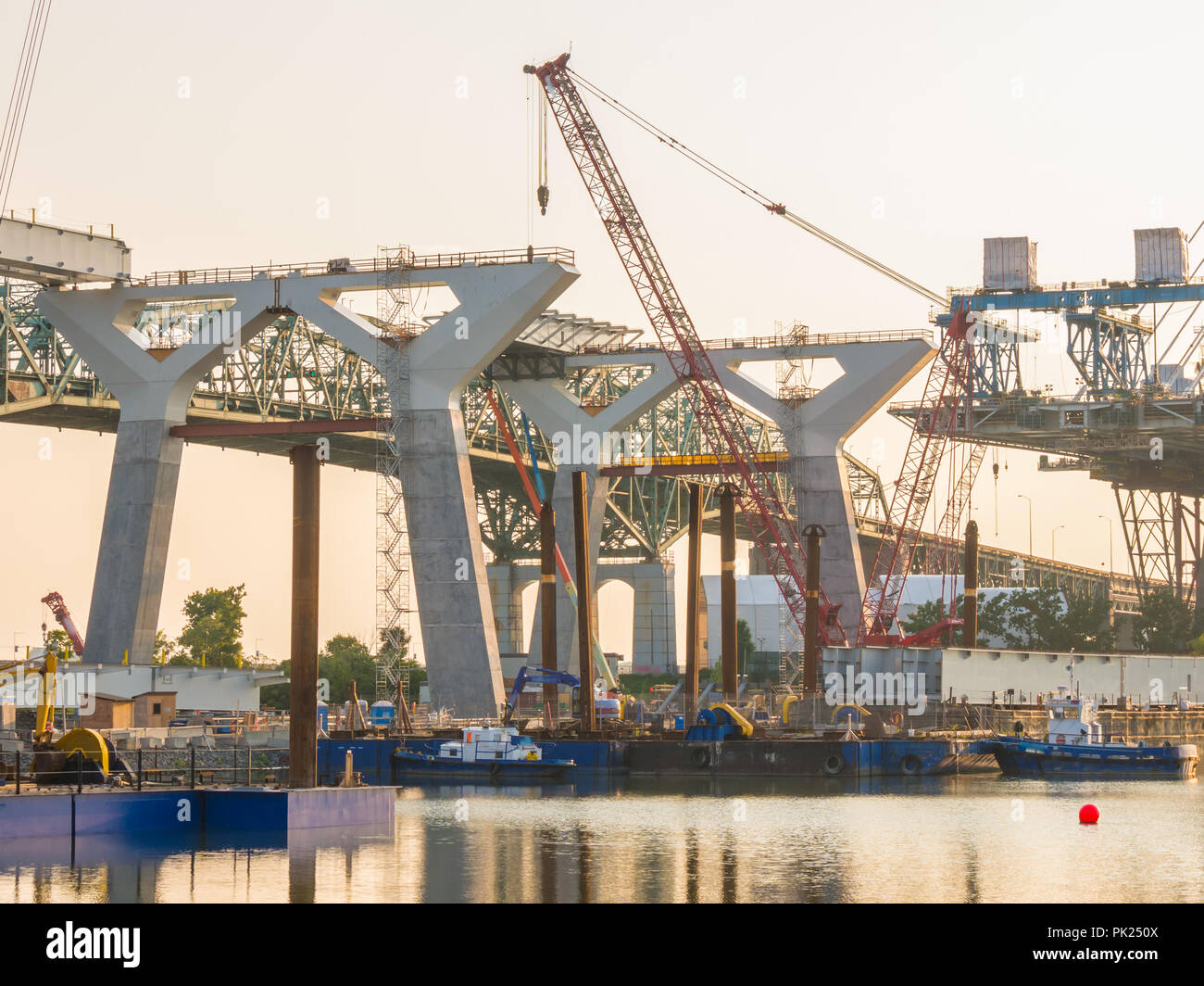Major bridge construction site at the golden hour, Montreal, quebec ...