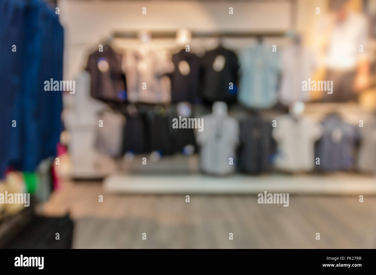 Abstract blurred photo of clothing store in a shopping mall, shopping ...