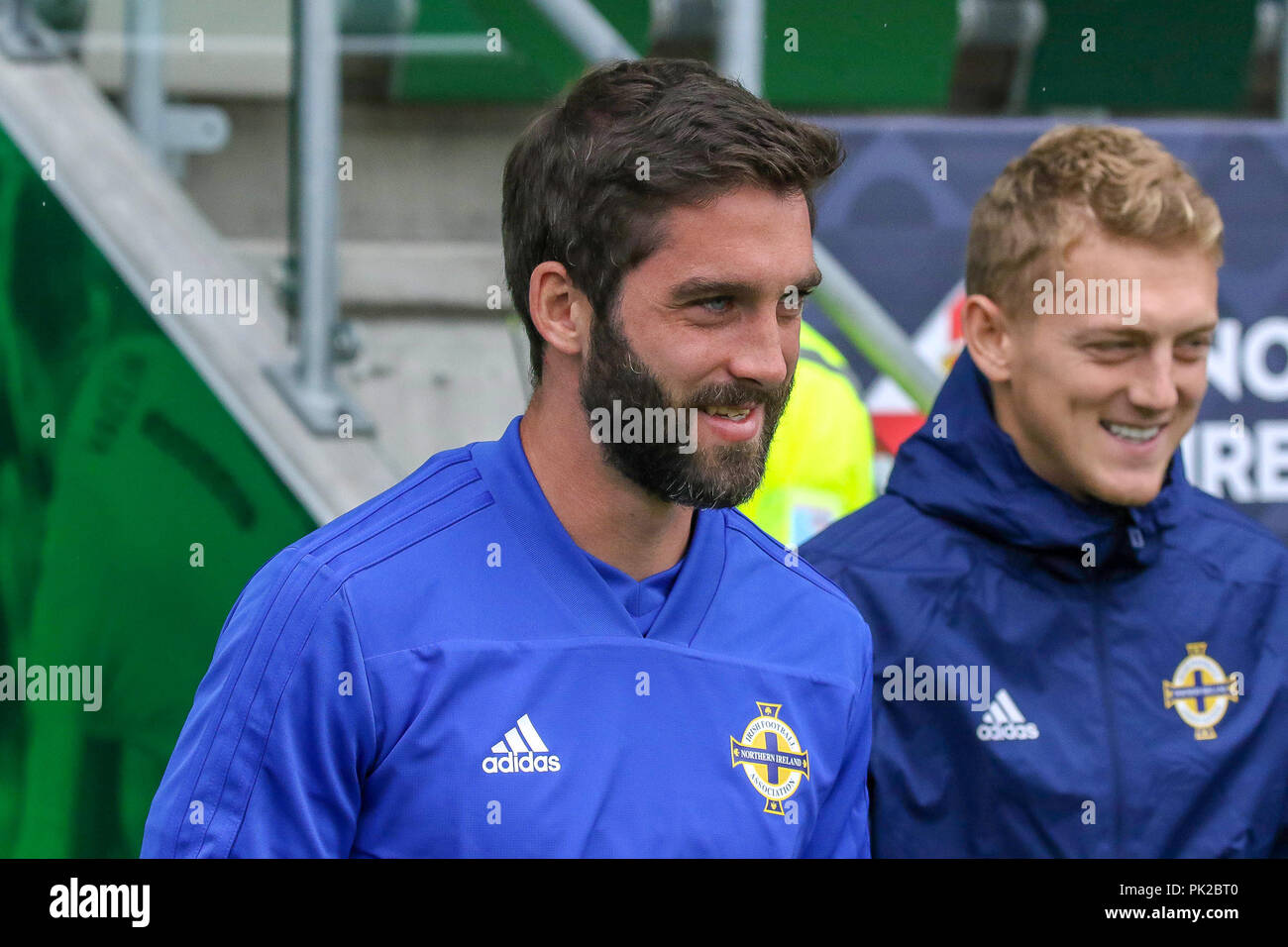 Windsor Park, Belfast, Northern Ireland. 10 September 2018. After Saturday's defeat in the UEFA Nations League, Northern Ireland returned to training this morning at Windsor Park. Tomorrow night they play Israel in a friendly international. Will Grigg (left) and George Saville. Credit: David Hunter/Alamy Live News. Stock Photo
