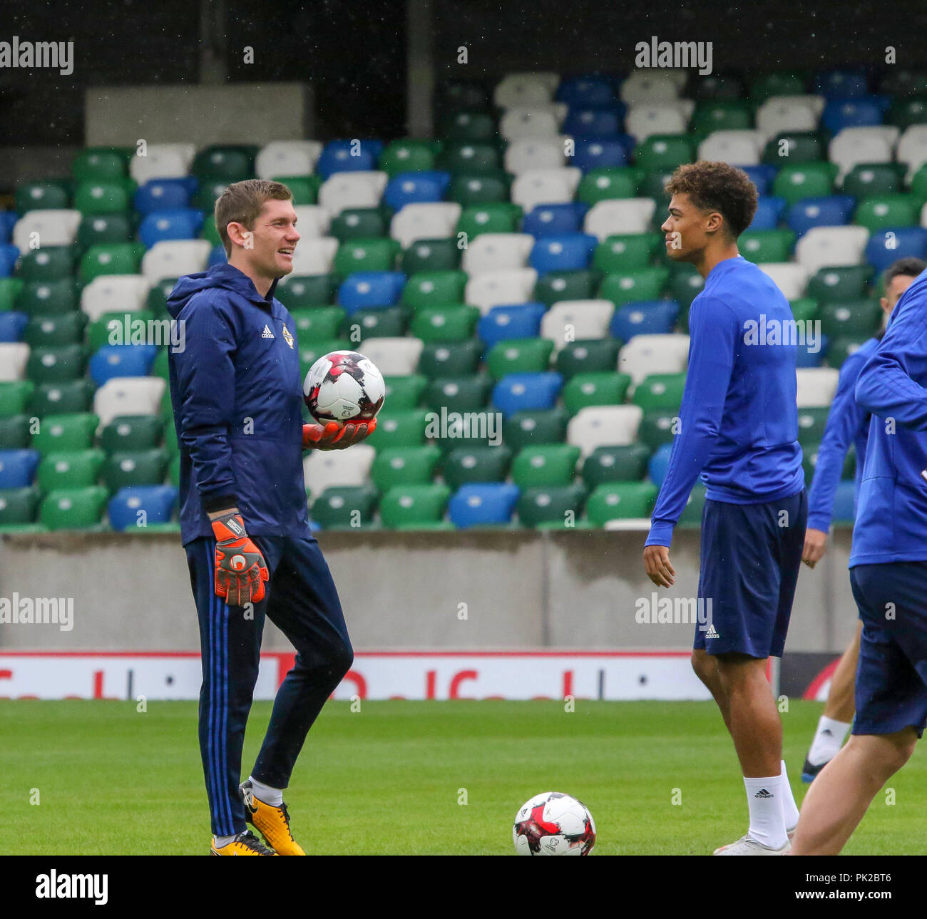 Windsor Park, Belfast, Northern Ireland. 10 September 2018. After Saturday's defeat in the UEFA Nations League, Northern Ireland returned to training this morning at Windsor Park. Tomorrow night they play Israel in a friendly international. Michael McGovern and Jamal Lewis (right). Credit: David Hunter/Alamy Live News. Stock Photo