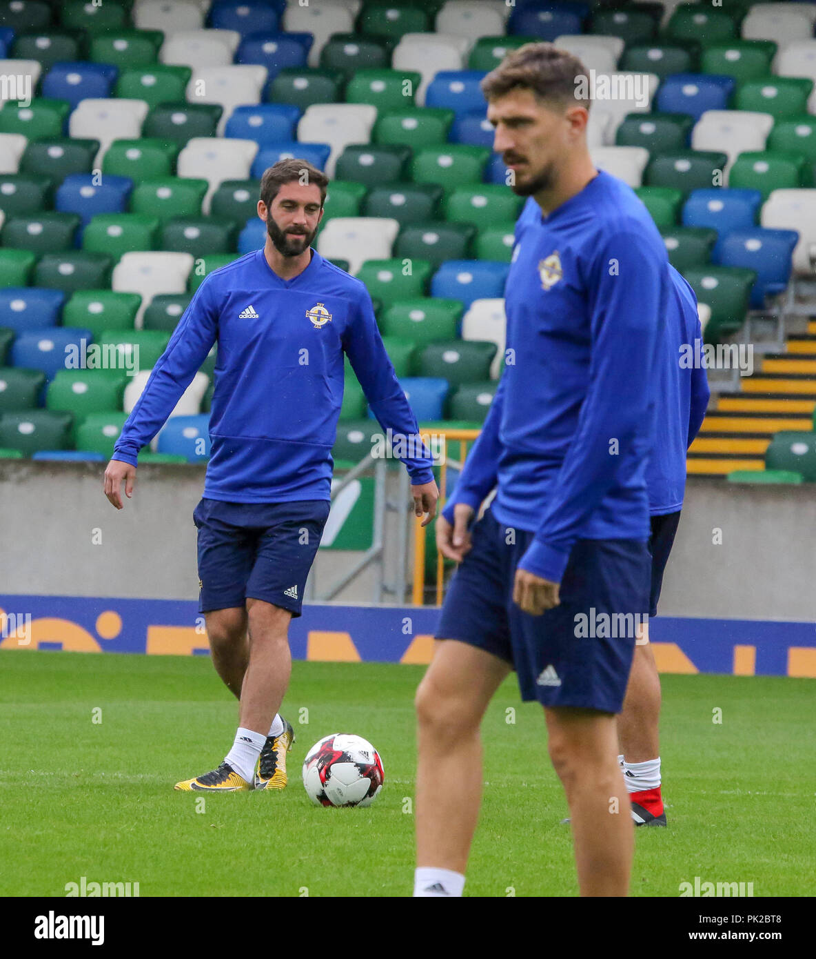 Windsor Park, Belfast, Northern Ireland. 10 September 2018. After Saturday's defeat in the UEFA Nations League, Northern Ireland returned to training this morning at Windsor Park. Tomorrow night they play Israel in a friendly international. Will Grigg (left) in training. Credit: David Hunter/Alamy Live News. Stock Photo
