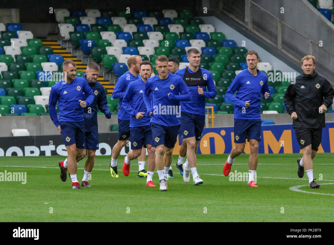 Windsor Park, Belfast, Northern Ireland. 10 September 2018. After Saturday's defeat in the UEFA Nations League, Northern Ireland returned to training this morning at Windsor Park. Tomorrow night they play Israel in a friendly international. Northern Ireland captain Steven Davis at the front in training. Credit: David Hunter/Alamy Live News. Stock Photo