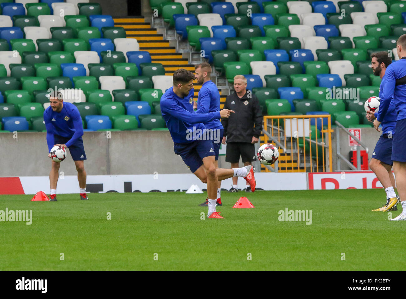 Windsor Park, Belfast, Northern Ireland. 10 September 2018. After Saturday's defeat in the UEFA Nations League, Northern Ireland returned to training this morning at Windsor Park. Tomorrow night they play Israel in a friendly international. Craig Cathcart (centre) in training. Credit: David Hunter/Alamy Live News. Stock Photo