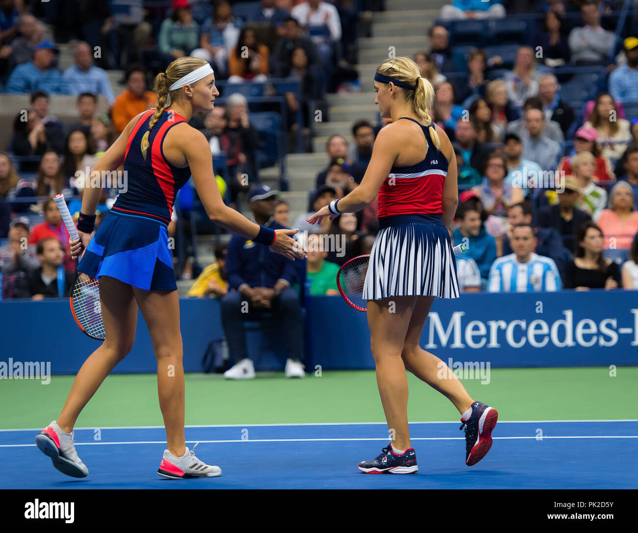 September 9, 2018 - Kristina Mladenovic of France & Timea Babos of Hungary  in action during the