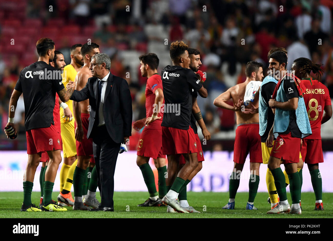 Lisbon, Portugal. 10th Sep, 2018. Fernando Santos (2nd L), head coach of Portugal celebrates with his players after the UEFA Nations League soccer match between Portugal and Italy at Luz Stadium in Lisbon, Portugal, on Sept. 10, 2018. Portugal won 1-0. Credit: Zhang Liyun/Xinhua/Alamy Live News Stock Photo