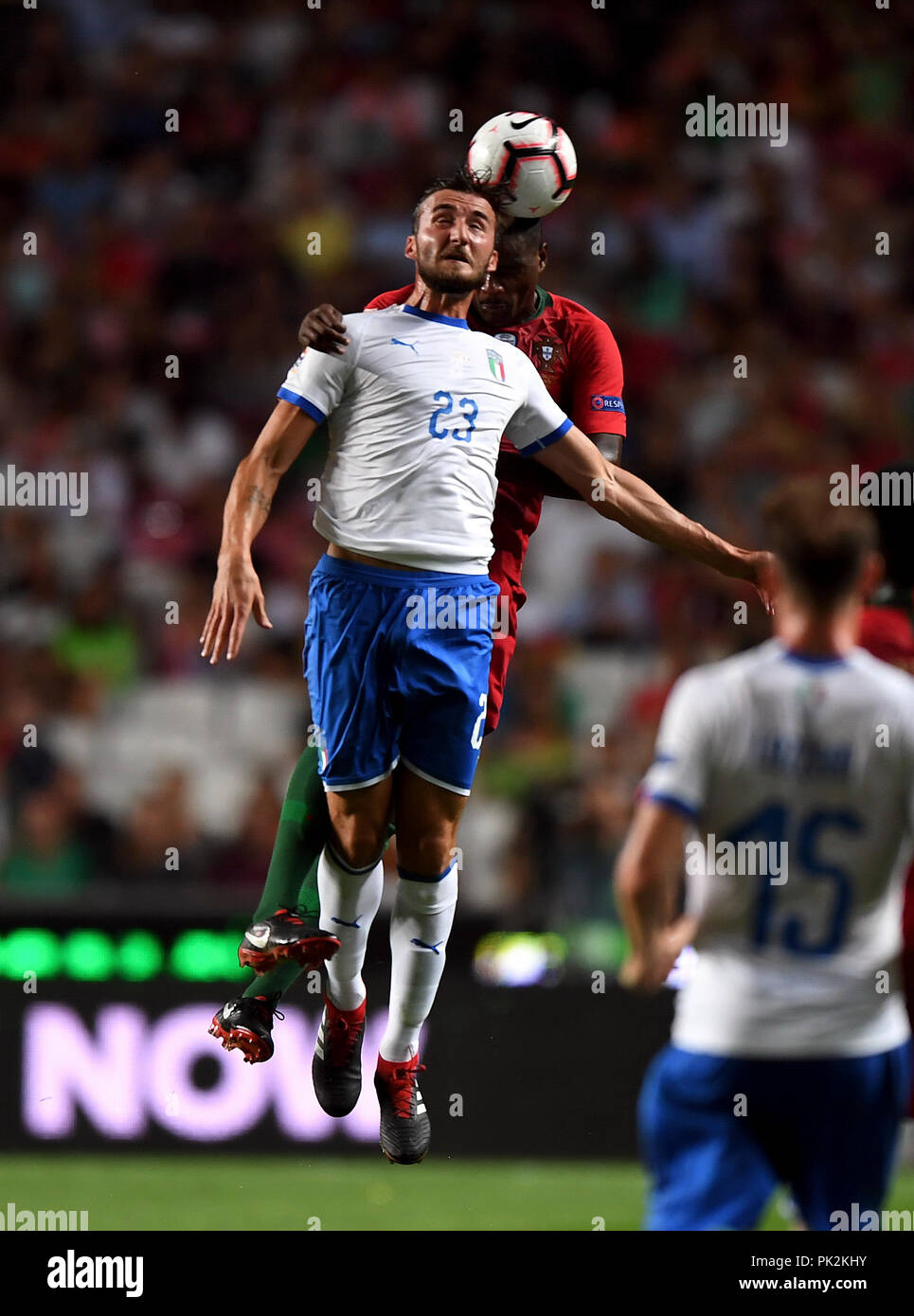 Lisbon, Portugal. 10th Sep, 2018. Bryan Cristante (L) of Italy heads the ball with William Carvalho of Portugal during the UEFA Nations League soccer match between Portugal and Italy at Luz Stadium in Lisbon, Portugal, on Sept. 10, 2018. Portugal won 1-0. Credit: Zhang Liyun/Xinhua/Alamy Live News Stock Photo