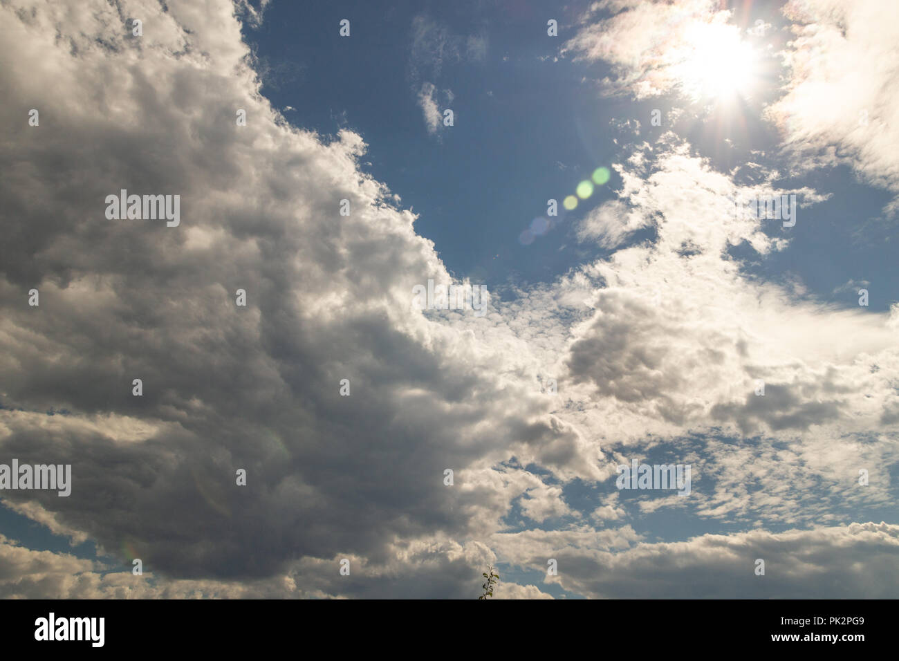 Clouds against the blue sky Stock Photo