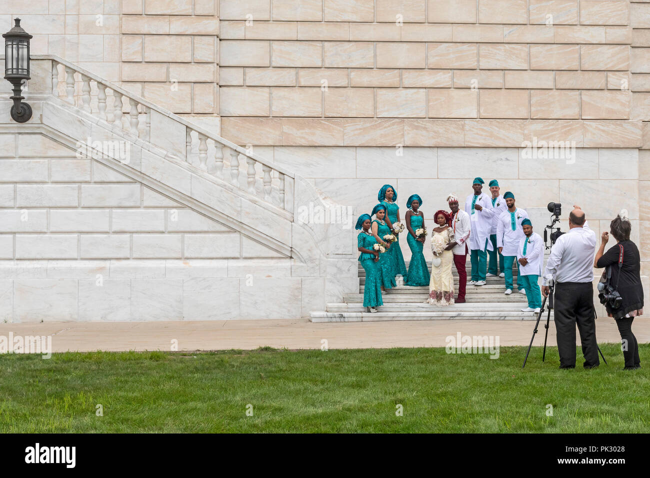 Detroit, Michigan - A wedding party poses for pictures outside the Detroit Institute of Arts. Stock Photo
