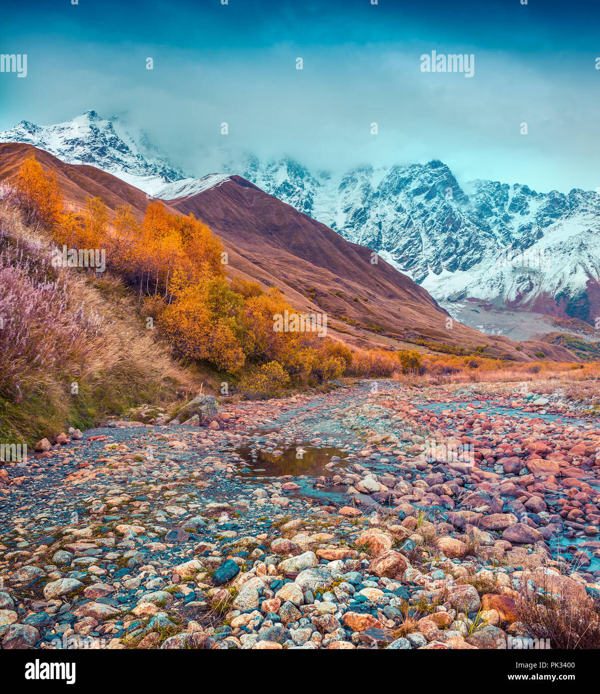 Foggy autumn morning in the Caucasus mountain. Foot of Mt. Shkhara, Upper Svaneti, Georgia, Europe.  Instagram toning. October 2015. Stock Photo