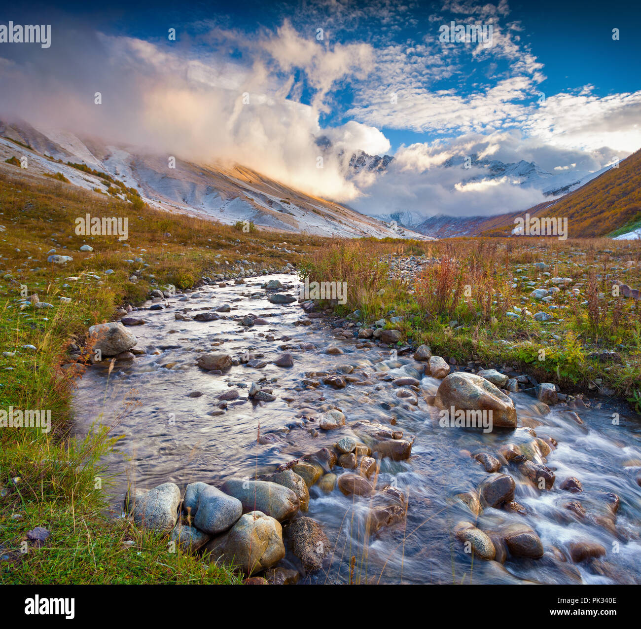 Colorful autumn morning in the Caucasus mountains with a pure mountain creek. Ushguli location, Upper Svaneti, Georgia, Europe. October 2015. Stock Photo