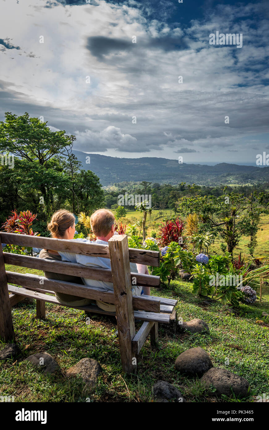 Couple enjoying the view from Mirador El Silencio Hotel, San Carlos, Costa Rica Stock Photo