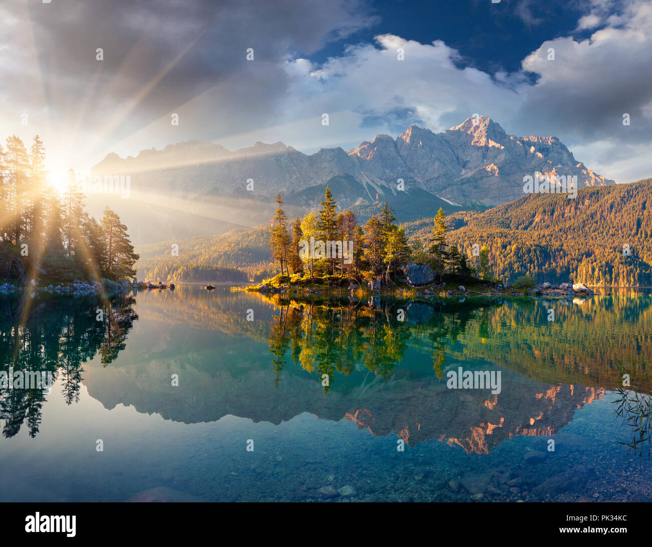 Misty summer morning on the Eibsee lake in German Alps. Germany, Europe. Stock Photo