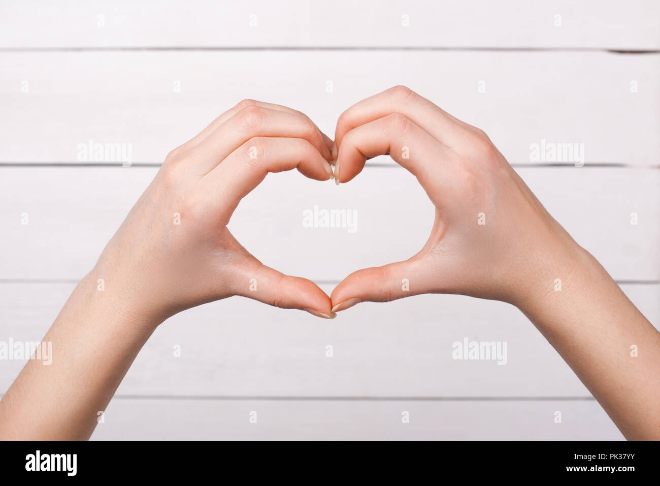 Ladies fingers show heart symbol. Love. Stock Photo