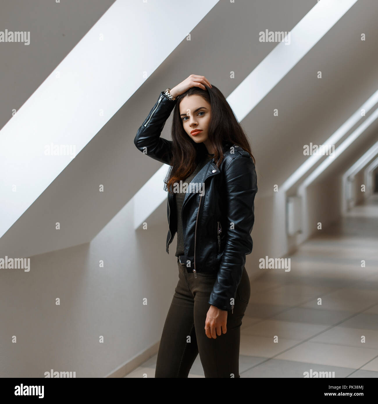Beautiful girl in black leather hi-res stock photography and images - Alamy