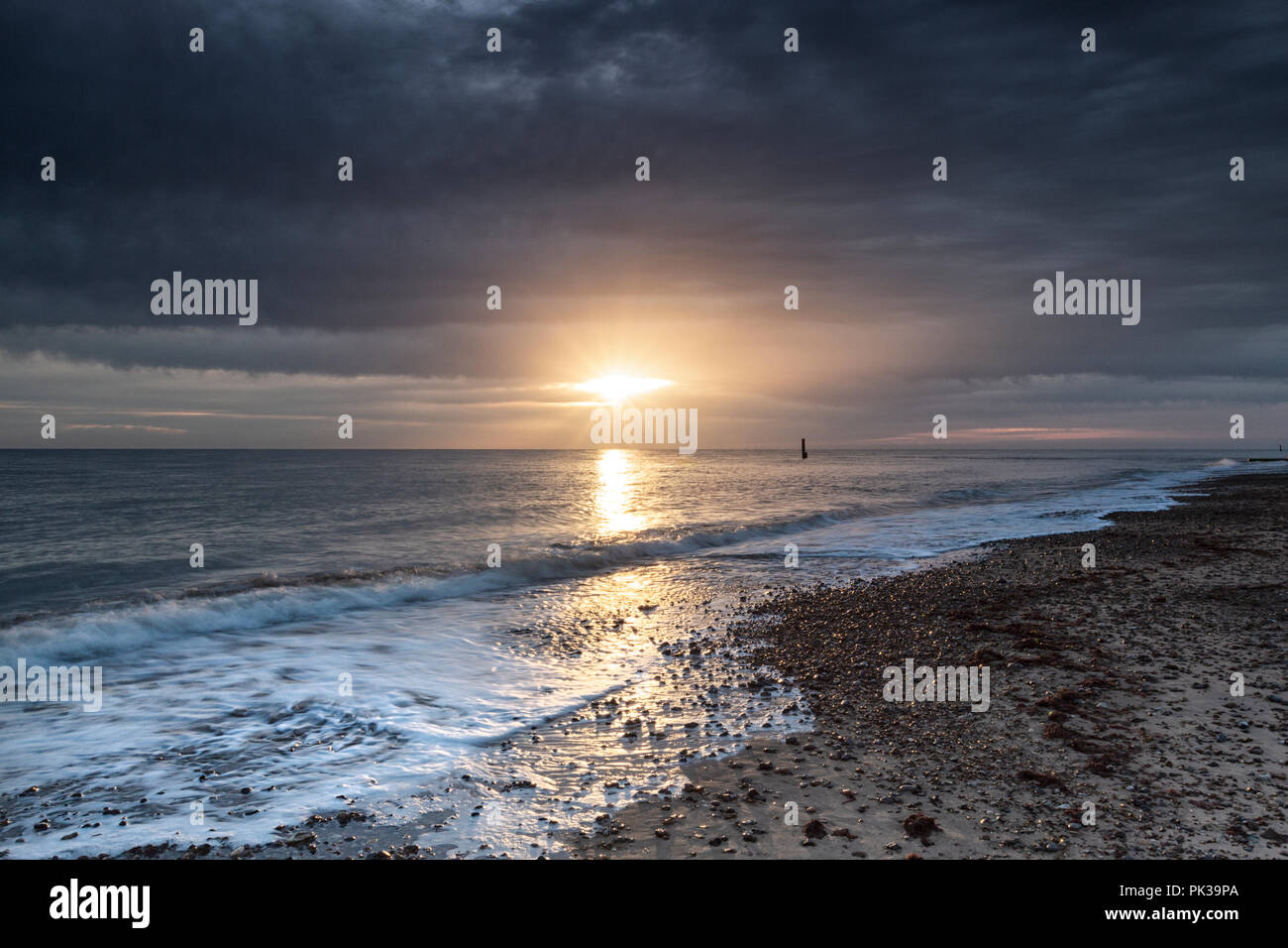 Sunrise at Cart Gap, Eccles on the Norfolk Coast, UK. Stock Photo