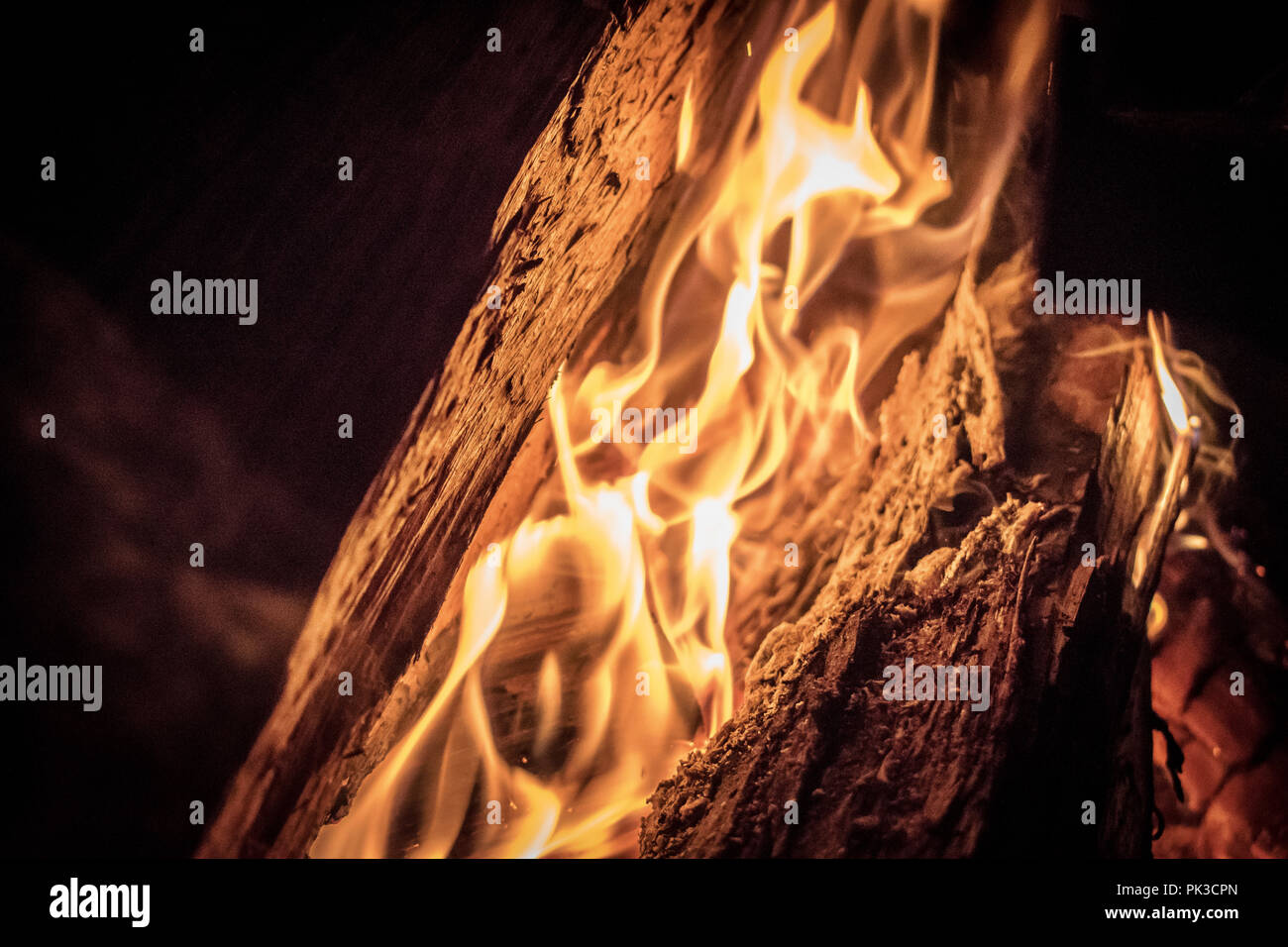 Close up shot up of a fire that lit our night and held some heat Stock Photo