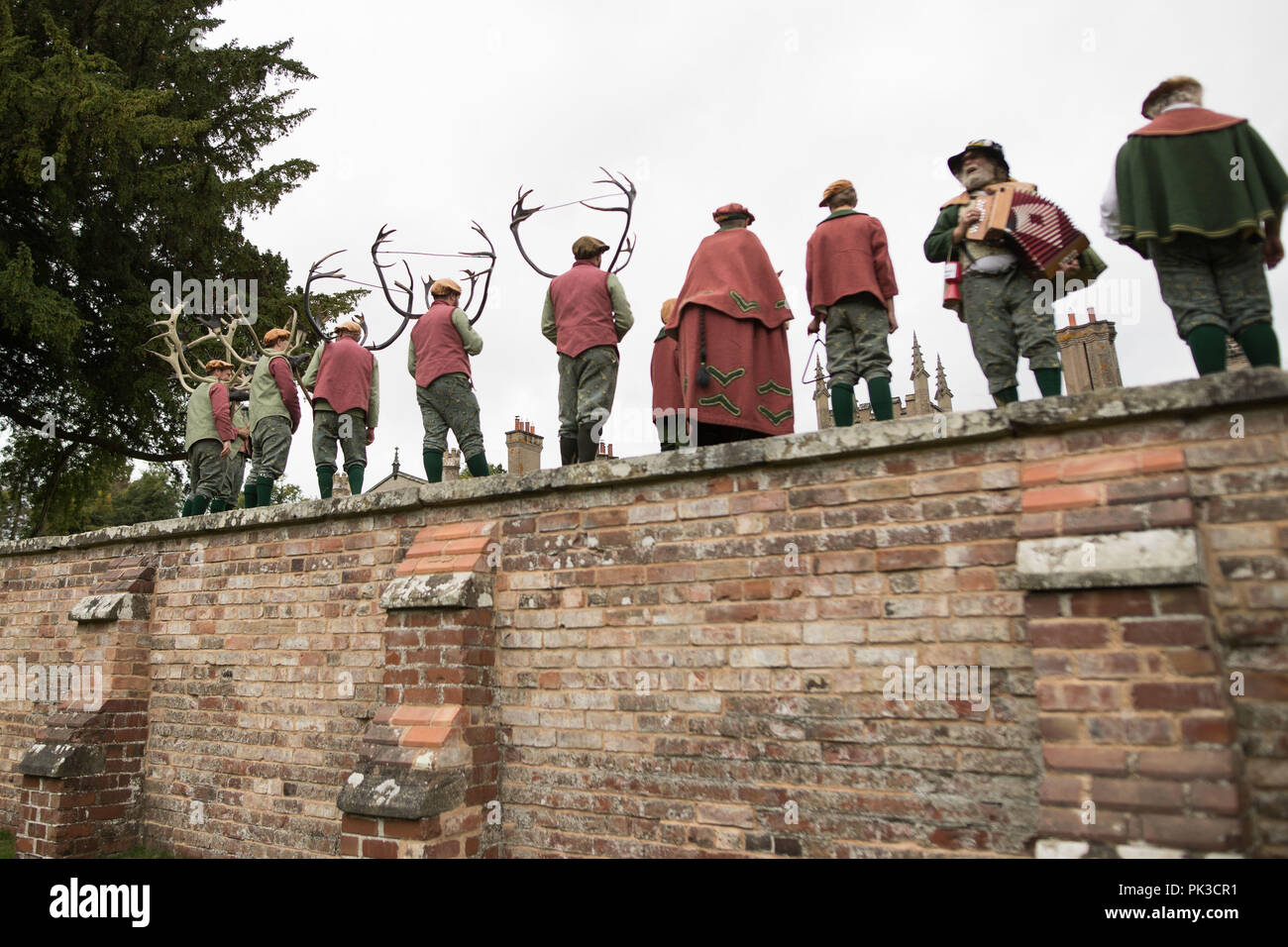 Dancers perform the Abbots Bromley Horn Dance, an English folk dance whose origins date back to the middle ages, in the Village of Abbots Bromley, Staffordshire. Stock Photo