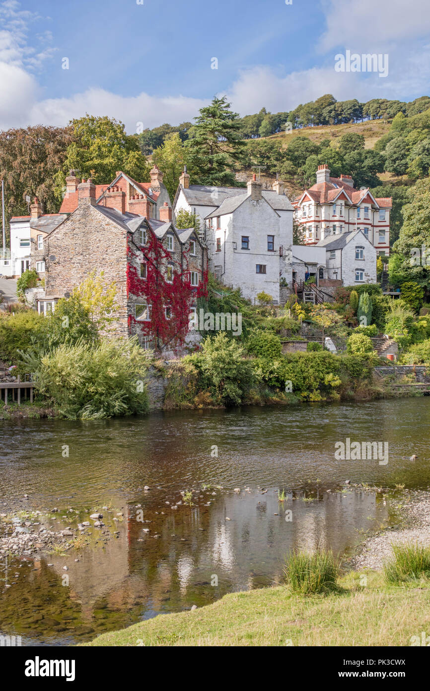 The picturesque riverside village of Carrog on the River Dee in the Vale of Llangollen, Wales, UK Stock Photo