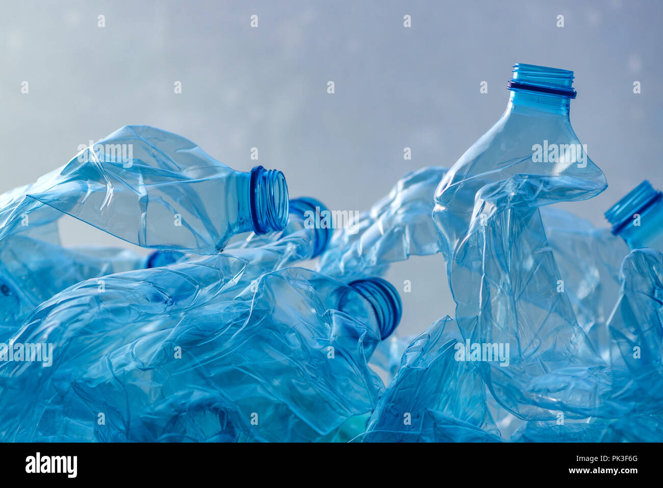 Crushed plastic recyclable milk container Stock Photo - Alamy