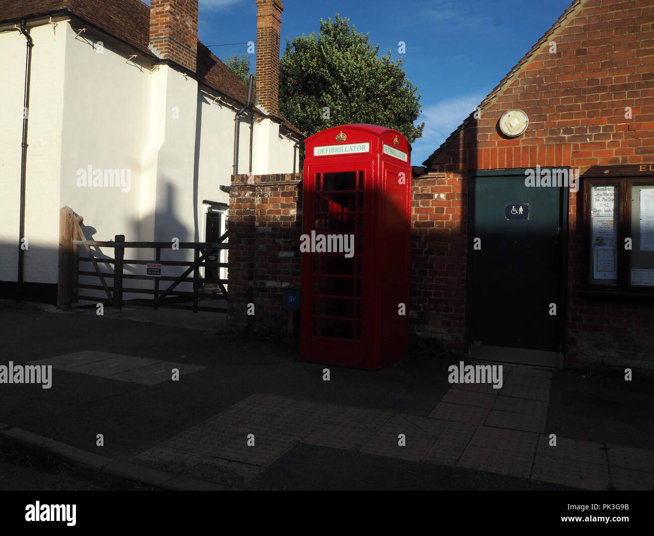 Defibrillator red phone box Stock Photo Alamy