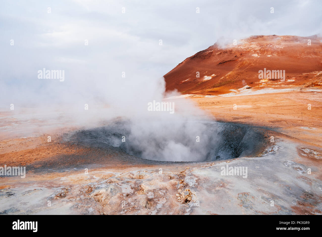 Namafjall - geothermal area in field of Hverir. Landscape which pools of boiling mud and hot springs. Tourist and natural attractions in Iceland Stock Photo